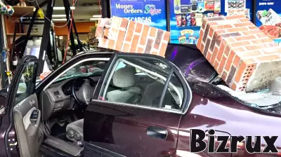 Teenager in hospital after car crashes into Chesterfield business